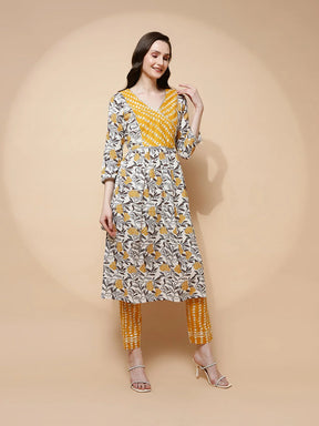 Yellow Cotton Blend Loose Fit Kurta Set For Women